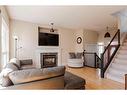 216 Pinnacle Place, Fort Mcmurray, AB  - Indoor Photo Showing Living Room With Fireplace 