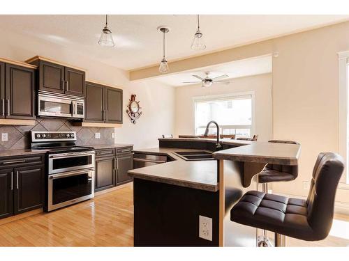 216 Pinnacle Place, Fort Mcmurray, AB - Indoor Photo Showing Kitchen With Double Sink With Upgraded Kitchen