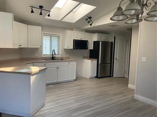 244 Mckinlay Crescent, Fort Mcmurray, AB - Indoor Photo Showing Kitchen With Double Sink