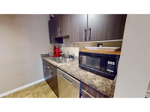 635-201 Abasand Drive, Fort Mcmurray, AB - Indoor Photo Showing Kitchen With Double Sink