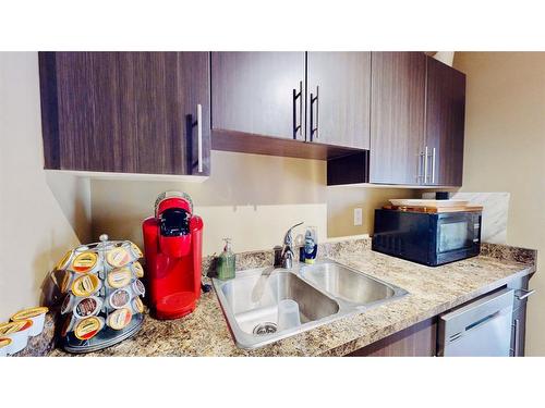 635-201 Abasand Drive, Fort Mcmurray, AB - Indoor Photo Showing Kitchen With Double Sink