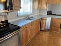 189 Couture Lane, Fort Mcmurray, AB  - Indoor Photo Showing Kitchen With Double Sink 