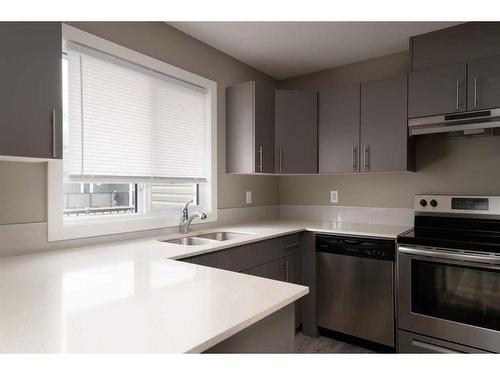 55-401 Athabasca Avenue, Fort Mcmurray, AB - Indoor Photo Showing Kitchen With Double Sink