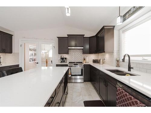 148 Eglert Drive, Fort Mcmurray, AB - Indoor Photo Showing Kitchen With Double Sink With Upgraded Kitchen