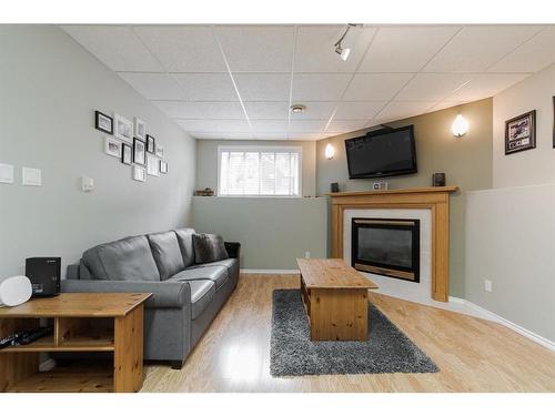 148 Eglert Drive, Fort Mcmurray, AB - Indoor Photo Showing Living Room With Fireplace