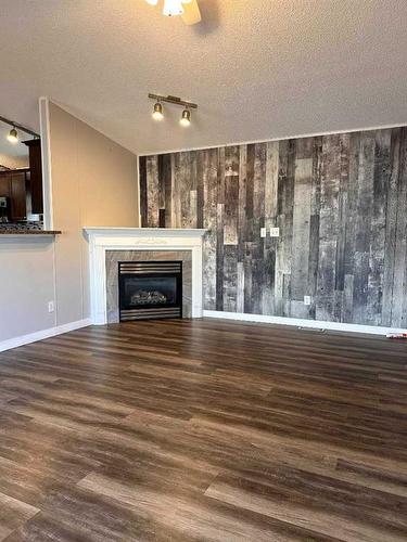 132 Morgan Avenue, Fort Mcmurray, AB - Indoor Photo Showing Living Room With Fireplace