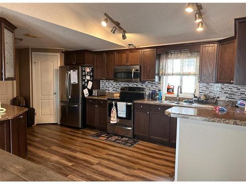 132 Morgan Avenue, Fort Mcmurray, AB - Indoor Photo Showing Kitchen With Double Sink