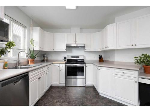 301-104 Loutit Road, Fort Mcmurray, AB - Indoor Photo Showing Kitchen With Double Sink