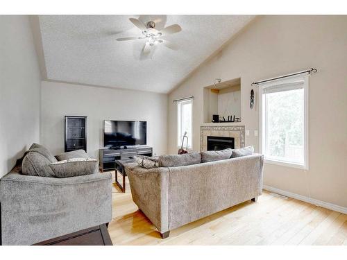 193 Archibald Close, Fort Mcmurray, AB - Indoor Photo Showing Living Room With Fireplace