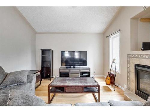 193 Archibald Close, Fort Mcmurray, AB - Indoor Photo Showing Living Room With Fireplace