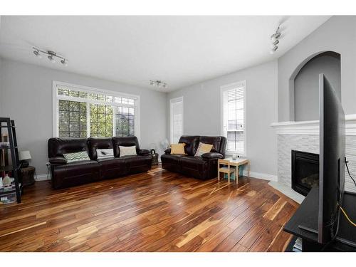 174 Grouse Way, Fort Mcmurray, AB - Indoor Photo Showing Living Room With Fireplace