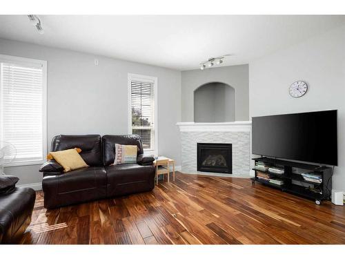 174 Grouse Way, Fort Mcmurray, AB - Indoor Photo Showing Living Room With Fireplace