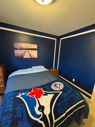 118-67062 Mission Rd, Lac La Biche, AB - Indoor Photo Showing Bedroom