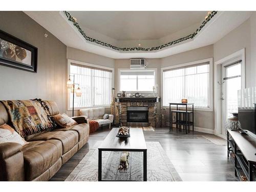 401-9918 Gordon Avenue, Fort Mcmurray, AB - Indoor Photo Showing Living Room With Fireplace