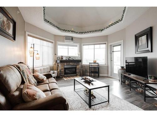 401-9918 Gordon Avenue, Fort Mcmurray, AB - Indoor Photo Showing Living Room With Fireplace