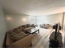 409-111 Charles Avenue, Fort Mcmurray, AB  - Indoor Photo Showing Living Room 