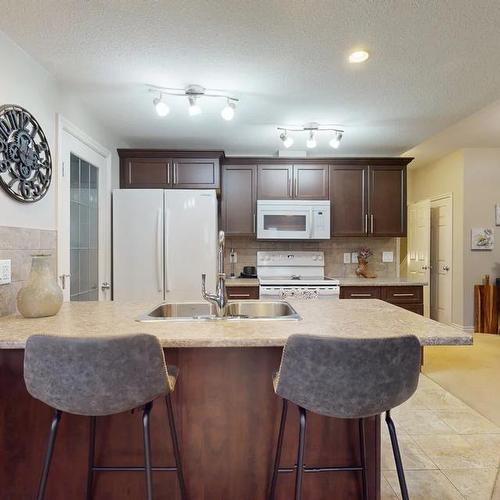 102-129 Fontaine Crescent, Fort Mcmurray, AB - Indoor Photo Showing Kitchen With Upgraded Kitchen