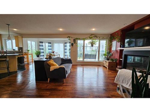 392 Killdeer Way, Fort Mcmurray, AB - Indoor Photo Showing Living Room With Fireplace