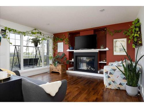 392 Killdeer Way, Fort Mcmurray, AB - Indoor Photo Showing Living Room With Fireplace