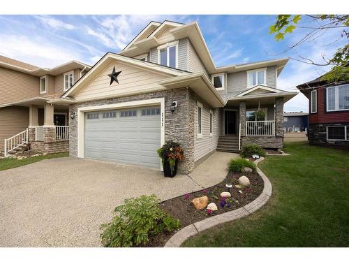 111 Widgeon Place, Fort Mcmurray, AB - Outdoor With Deck Patio Veranda With Facade