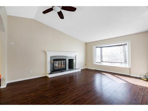 105 Ball Place, Fort Mcmurray, AB - Indoor Photo Showing Living Room With Fireplace