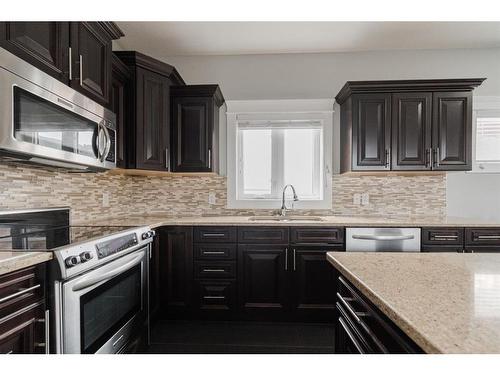 201 Ward Crescent, Fort Mcmurray, AB - Indoor Photo Showing Kitchen With Upgraded Kitchen