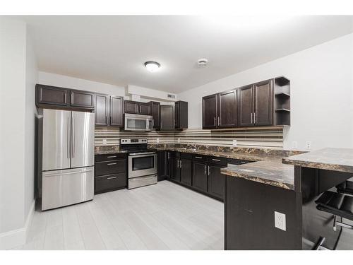 201 Ward Crescent, Fort Mcmurray, AB - Indoor Photo Showing Kitchen With Stainless Steel Kitchen With Upgraded Kitchen