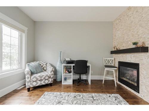 201 Ward Crescent, Fort Mcmurray, AB - Indoor Photo Showing Living Room With Fireplace