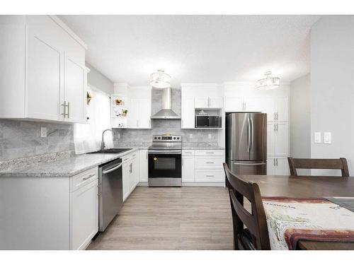 13 Bennett Crescent, Fort Mcmurray, AB - Indoor Photo Showing Kitchen With Upgraded Kitchen