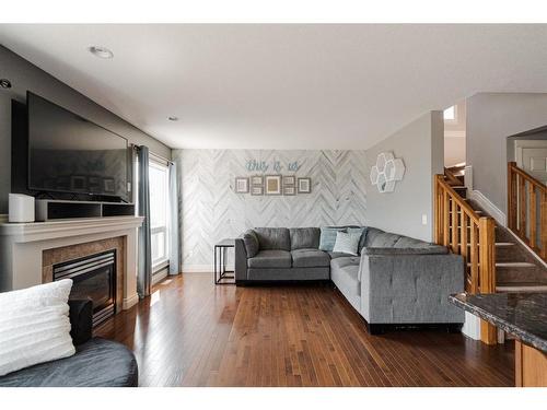 205 Diamondstone Ridge, Fort Mcmurray, AB - Indoor Photo Showing Living Room With Fireplace