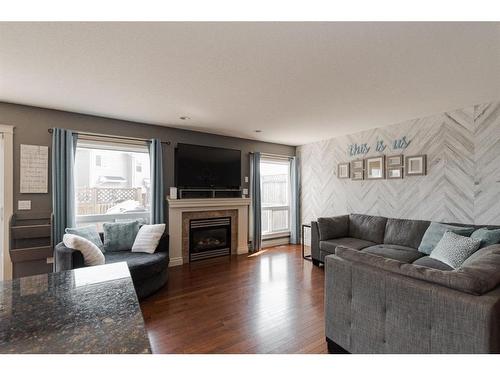 205 Diamondstone Ridge, Fort Mcmurray, AB - Indoor Photo Showing Living Room With Fireplace