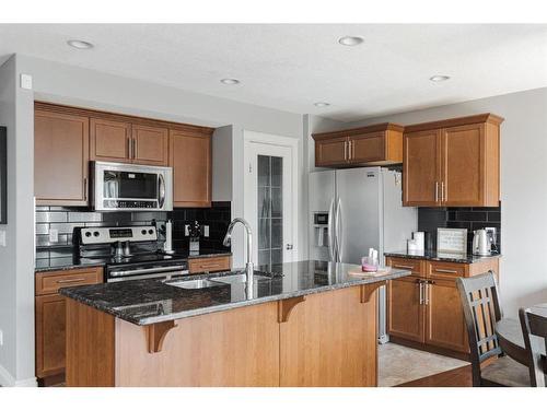 205 Diamondstone Ridge, Fort Mcmurray, AB - Indoor Photo Showing Kitchen With Stainless Steel Kitchen