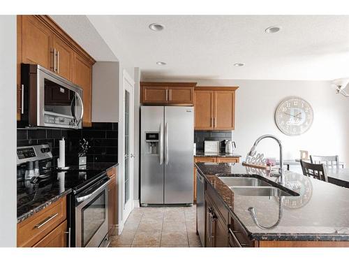 205 Diamondstone Ridge, Fort Mcmurray, AB - Indoor Photo Showing Kitchen With Stainless Steel Kitchen With Double Sink