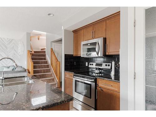 205 Diamondstone Ridge, Fort Mcmurray, AB - Indoor Photo Showing Kitchen With Stainless Steel Kitchen With Double Sink With Upgraded Kitchen