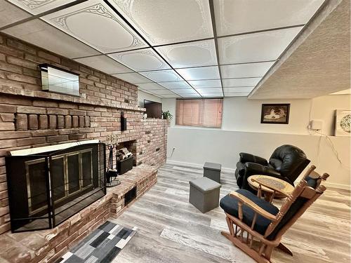 10306 104 Ave, Lac La Biche, AB - Indoor With Fireplace