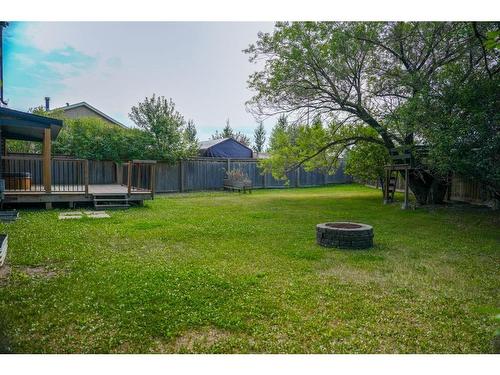 210 Kennedy Crescent, Fort Mcmurray, AB - Outdoor With Backyard