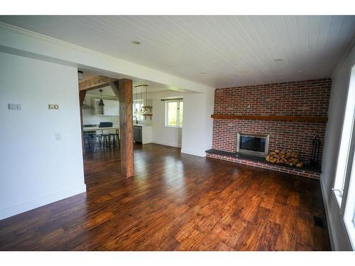 210 Kennedy Crescent, Fort Mcmurray, AB - Indoor Photo Showing Living Room With Fireplace