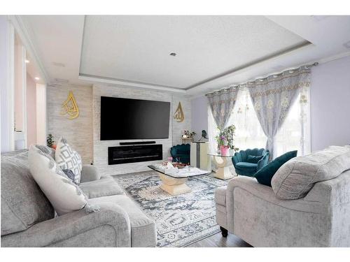 129 Rosslyn Street, Fort Mcmurray, AB - Indoor Photo Showing Living Room With Fireplace