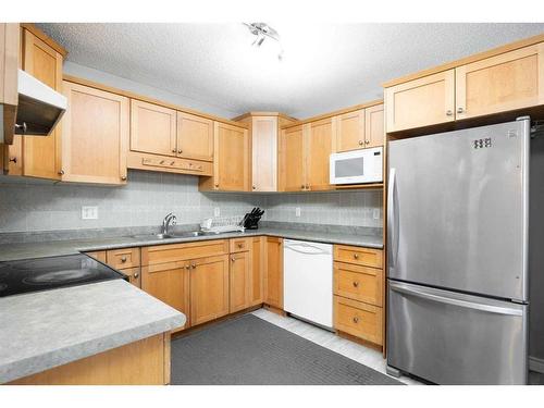 222 Carteret Drive, Fort Mcmurray, AB - Indoor Photo Showing Kitchen With Double Sink