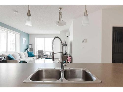 2514-135B Sandpiper Road, Fort Mcmurray, AB - Indoor Photo Showing Kitchen With Double Sink