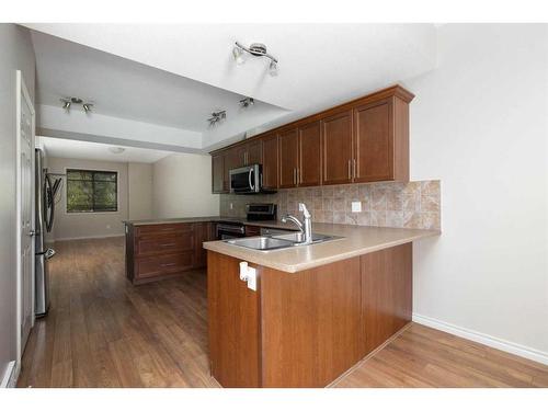 5-136 Fontaine Crescent, Fort Mcmurray, AB - Indoor Photo Showing Kitchen With Double Sink