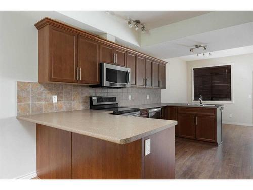 5-136 Fontaine Crescent, Fort Mcmurray, AB - Indoor Photo Showing Kitchen With Double Sink