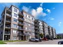 309-136C Sandpiper Road, Fort Mcmurray, AB  - Outdoor With Balcony With Facade 