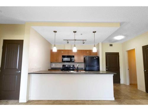 309-136C Sandpiper Road, Fort Mcmurray, AB - Indoor Photo Showing Kitchen