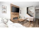 105 Arncliff Court, Fort Mcmurray, AB  - Indoor Photo Showing Living Room With Fireplace 