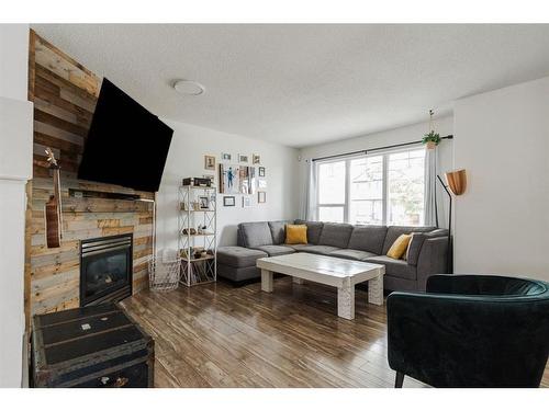 182 Grouse Way, Fort Mcmurray, AB - Indoor Photo Showing Living Room With Fireplace