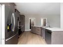 138 Magpie Street, Fort Mcmurray, AB  - Indoor Photo Showing Kitchen With Double Sink 