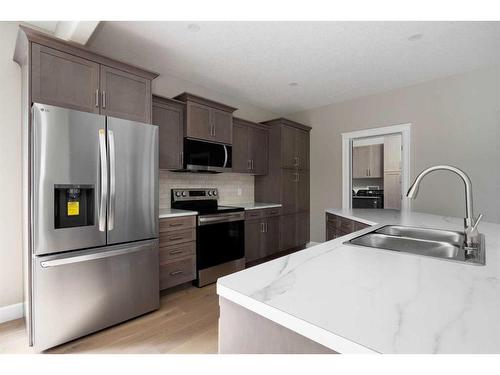 138 Magpie Street, Fort Mcmurray, AB - Indoor Photo Showing Kitchen With Double Sink