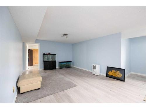 149 Kennedy Crescent, Fort Mcmurray, AB - Indoor Photo Showing Living Room With Fireplace