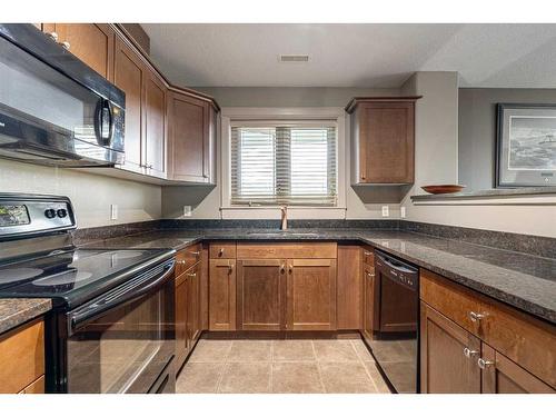 705-8535 Clearwater Drive, Fort Mcmurray, AB - Indoor Photo Showing Kitchen